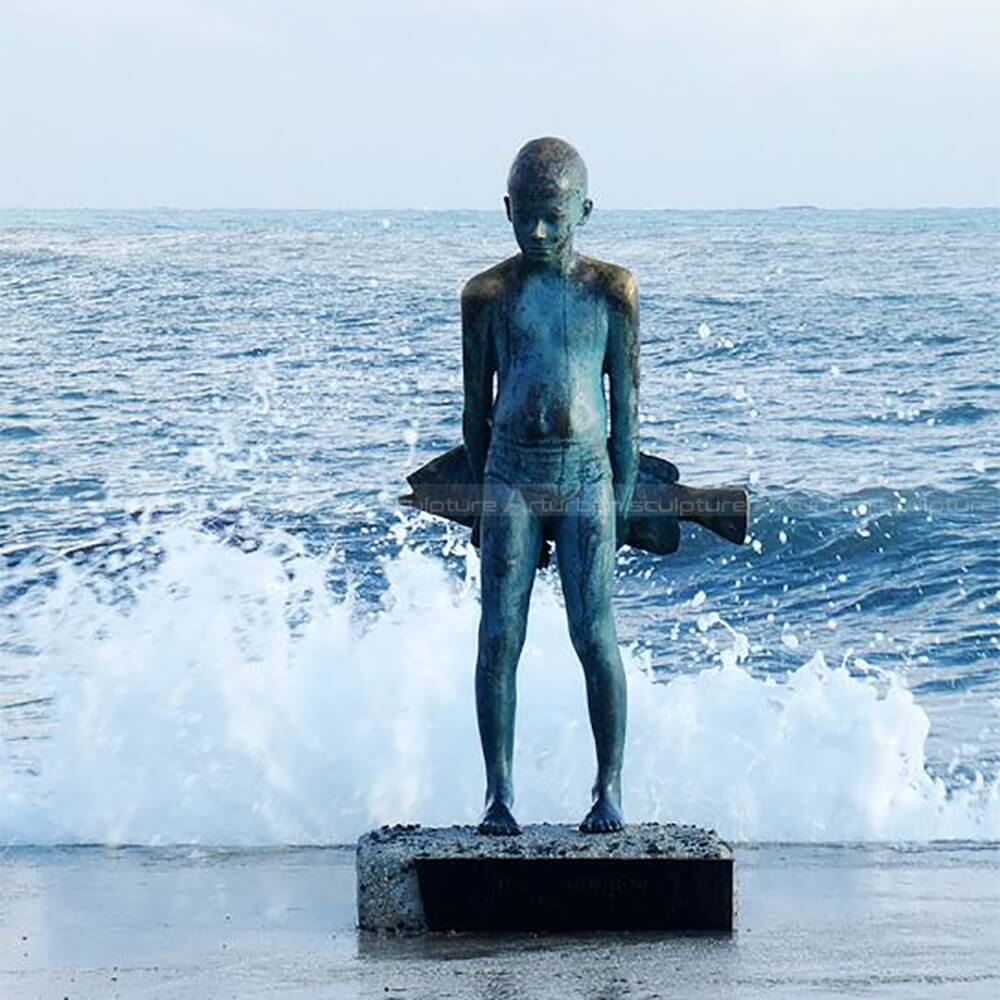 little fisherman statue