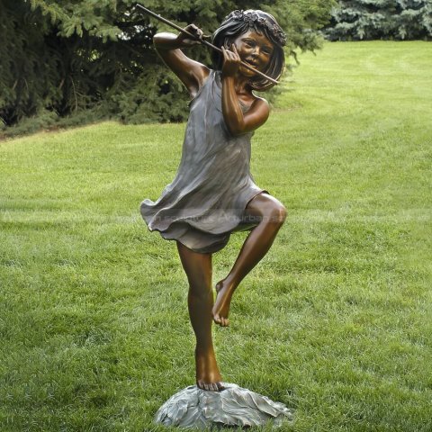 girl with flute sculpture