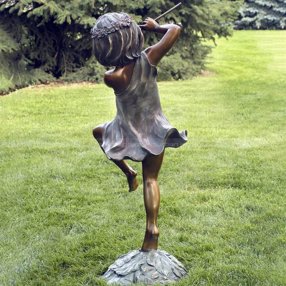 girl with flute sculpture