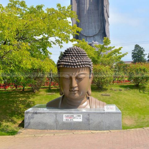 large buddha head statues