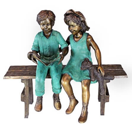Boy and Girl on Bench Sculpture