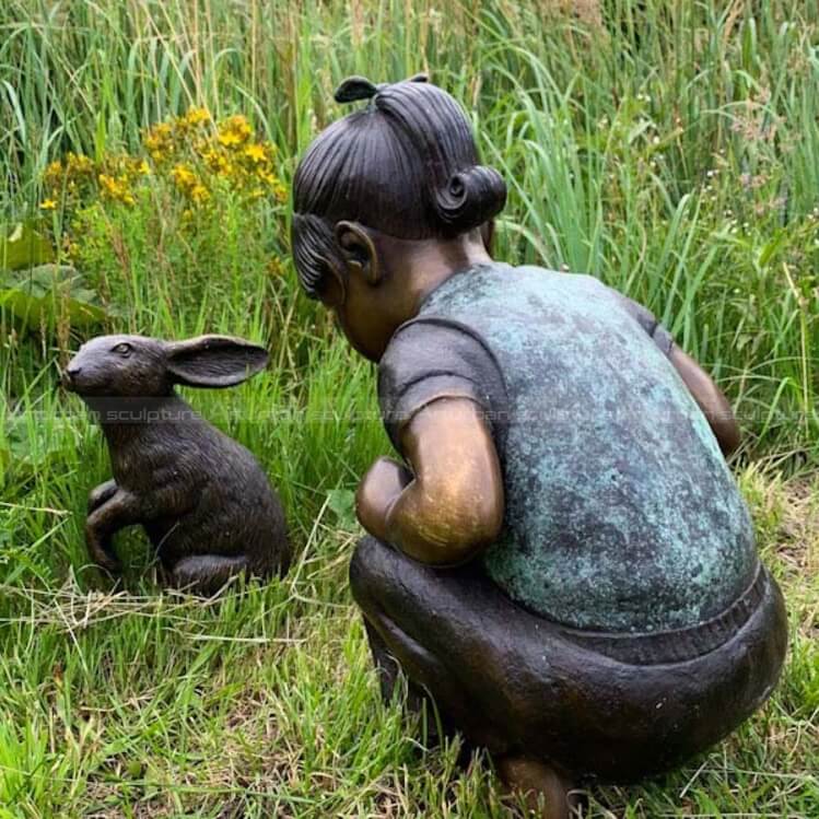 girl with rabbit statue