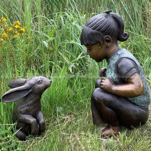 girl with rabbit statue