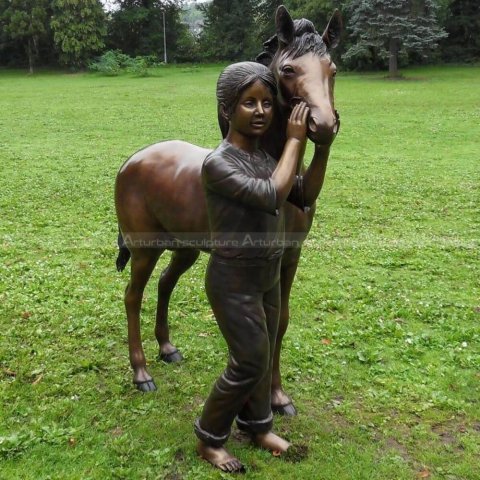 girl and her horse sculpture