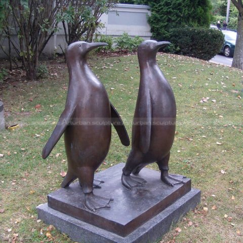 metal penguin sculpture