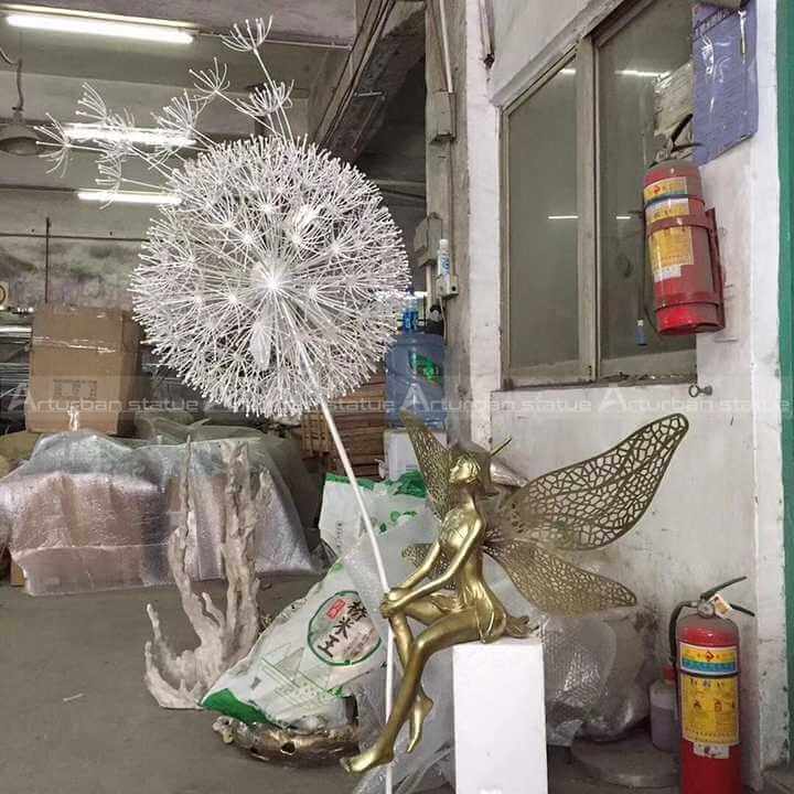 garden fairy dandelion sculpture