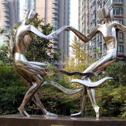 couple dancing statue