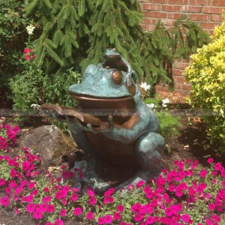 reading frog family garden sculpture