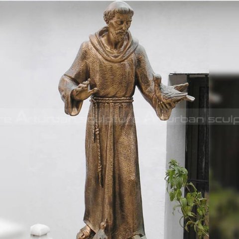 st francis statue with birds
