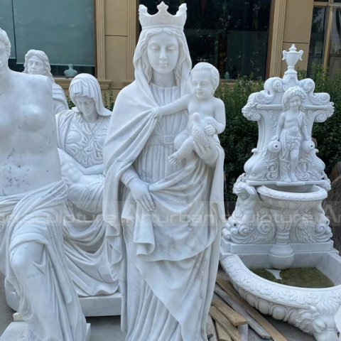 virgin mary holding jesus sculpture