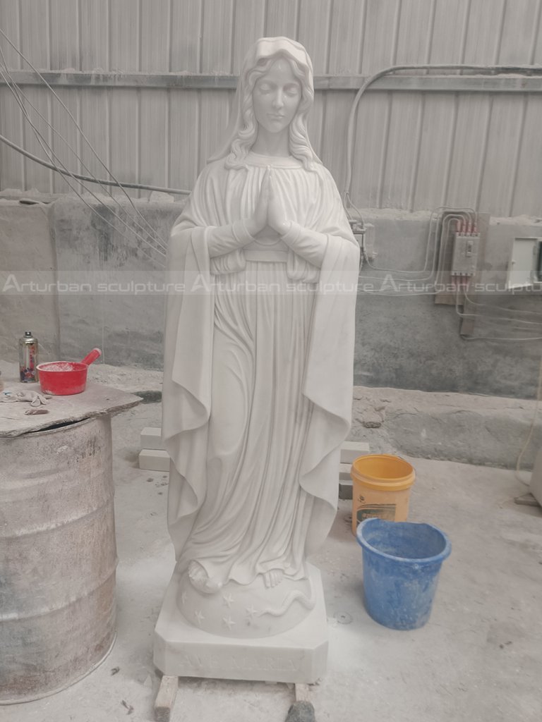 Marble virgin Mary statue is a sculpture with religious significance and artistic value. This sculpture is based on the theme of the Virgin Mary