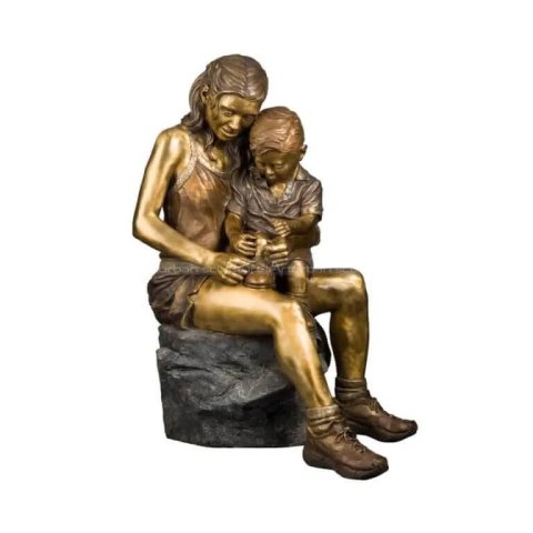 boy and girl bronze sculpture