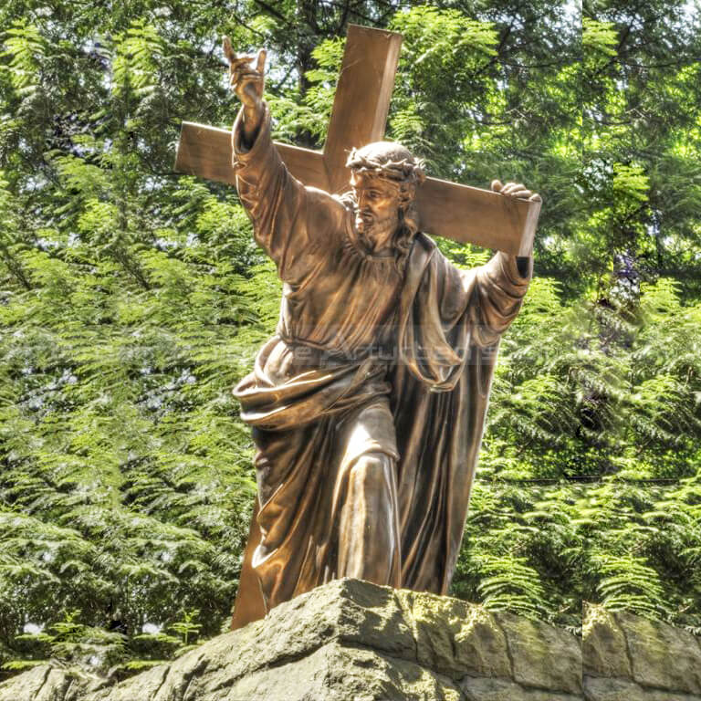christ carrying the cross statue