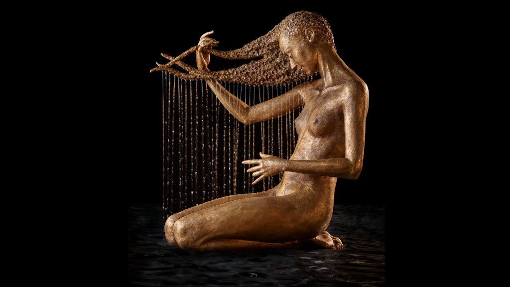 girl washing her hair sculpture