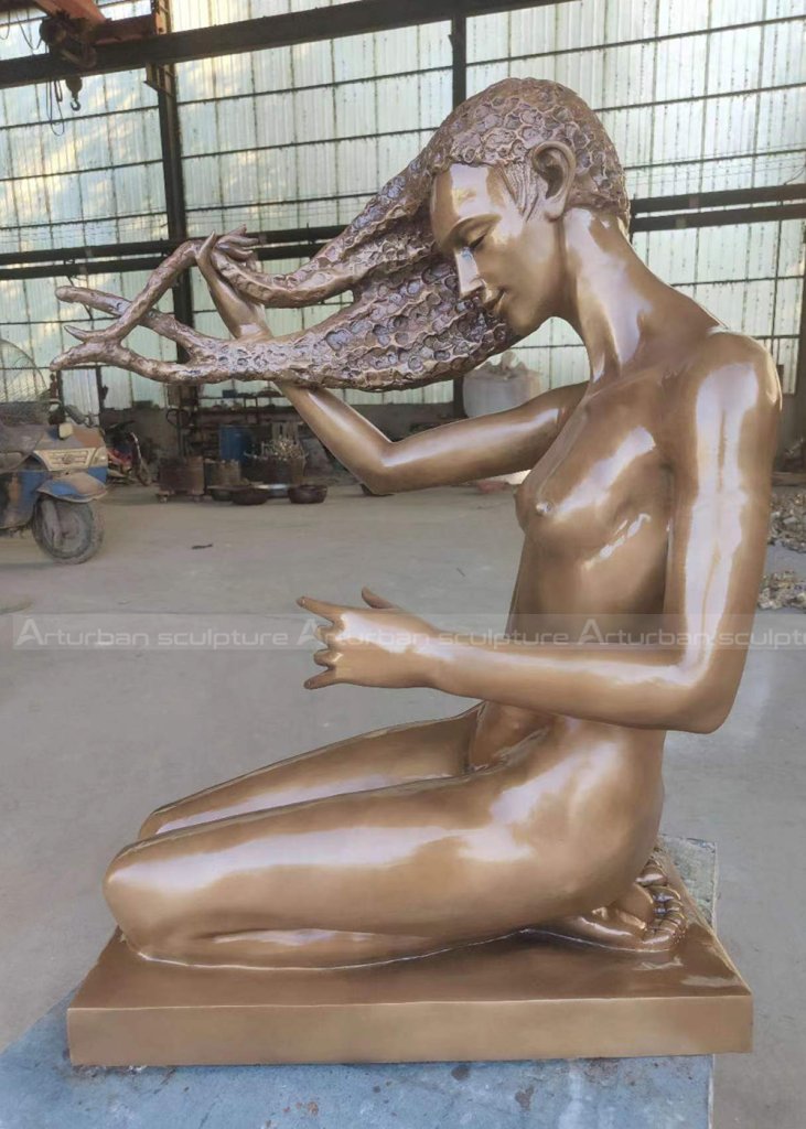 girl washing her hair sculpture