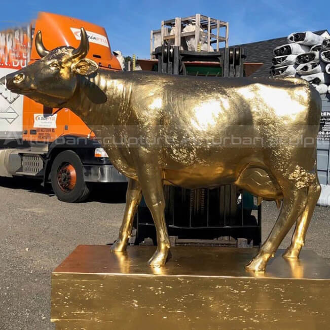 brass cow statuers