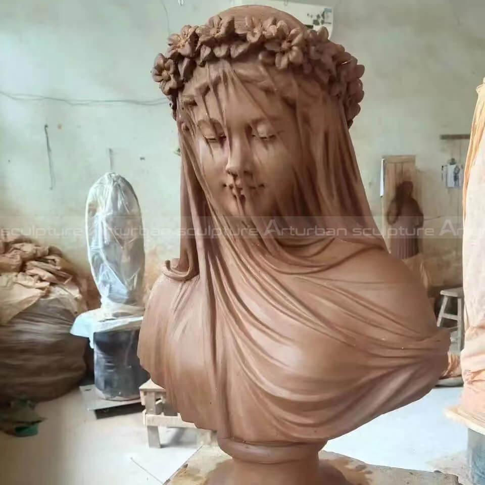 veiled goddess statue