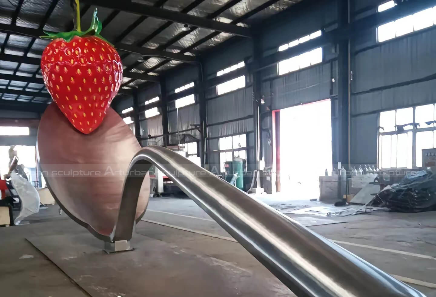 spoon and strawberry statue
