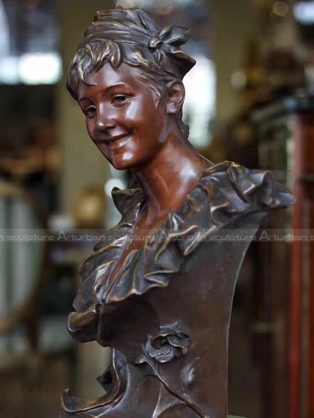 bronze female bust