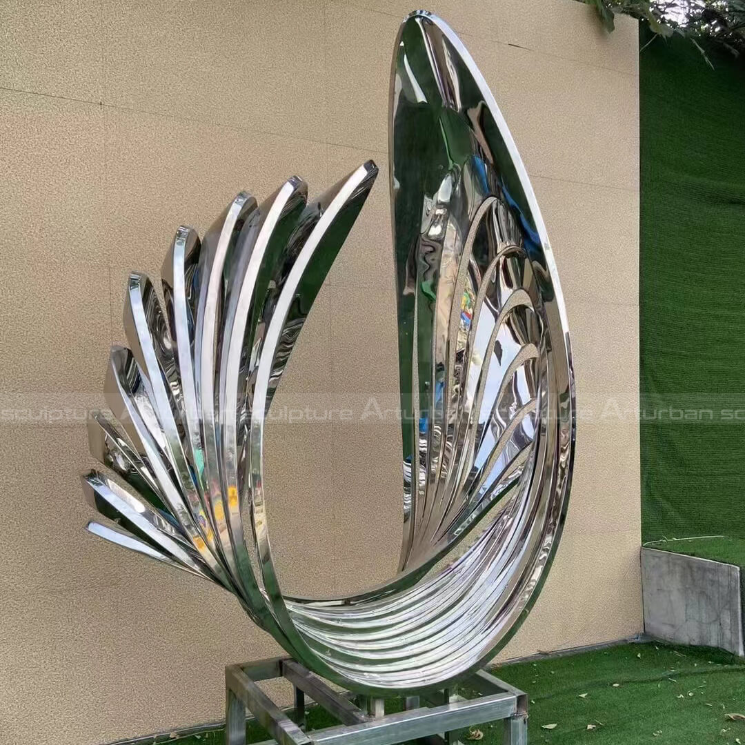 Mirror-polished stainless steel abstract sculpture